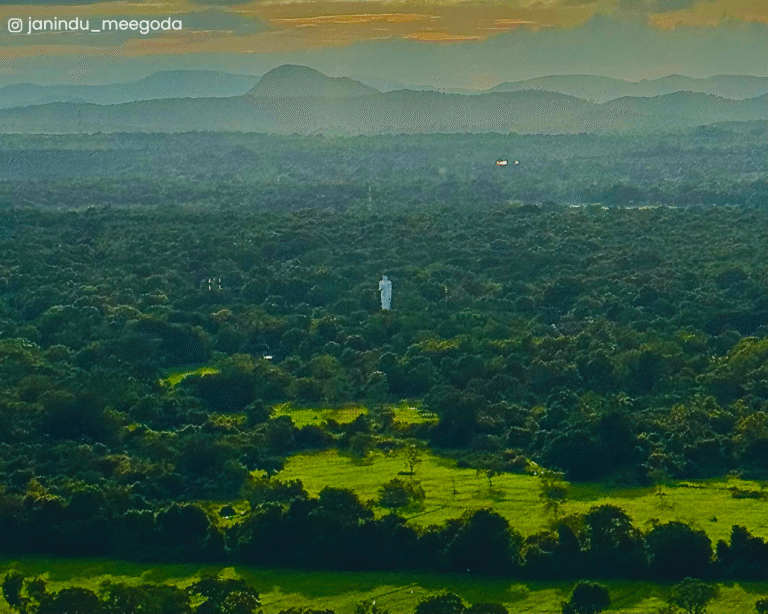 Sunset over distant plains and mountains