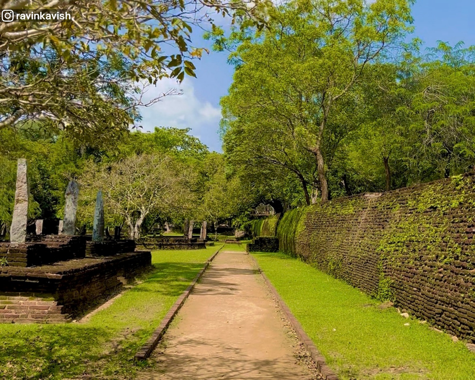 Ancient Alahana Monastery surrounded by walls with remaining structures and pathway, Polonnaruwa