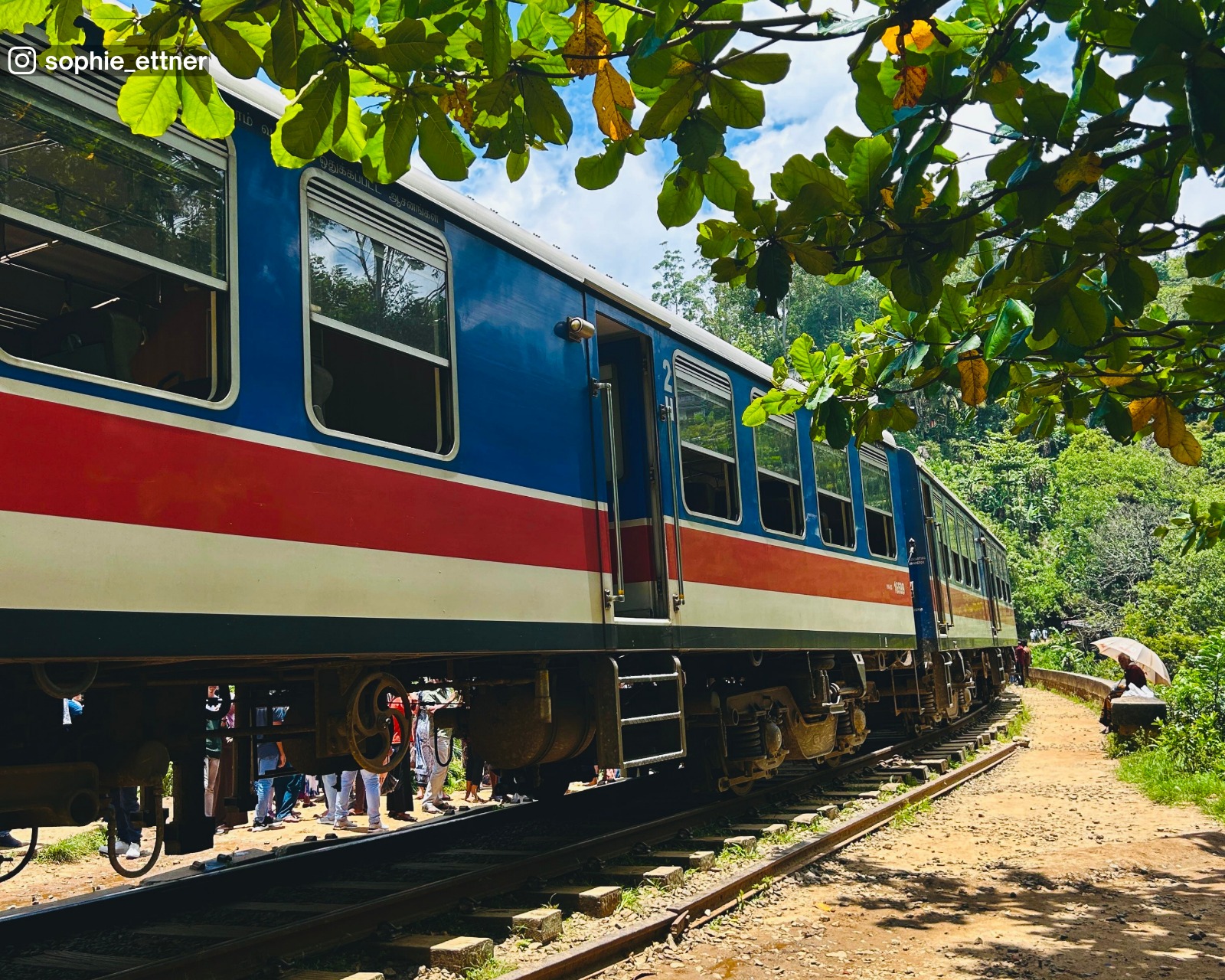 Close-up shot of a train passing on the Nine Arch Bridge in Ella