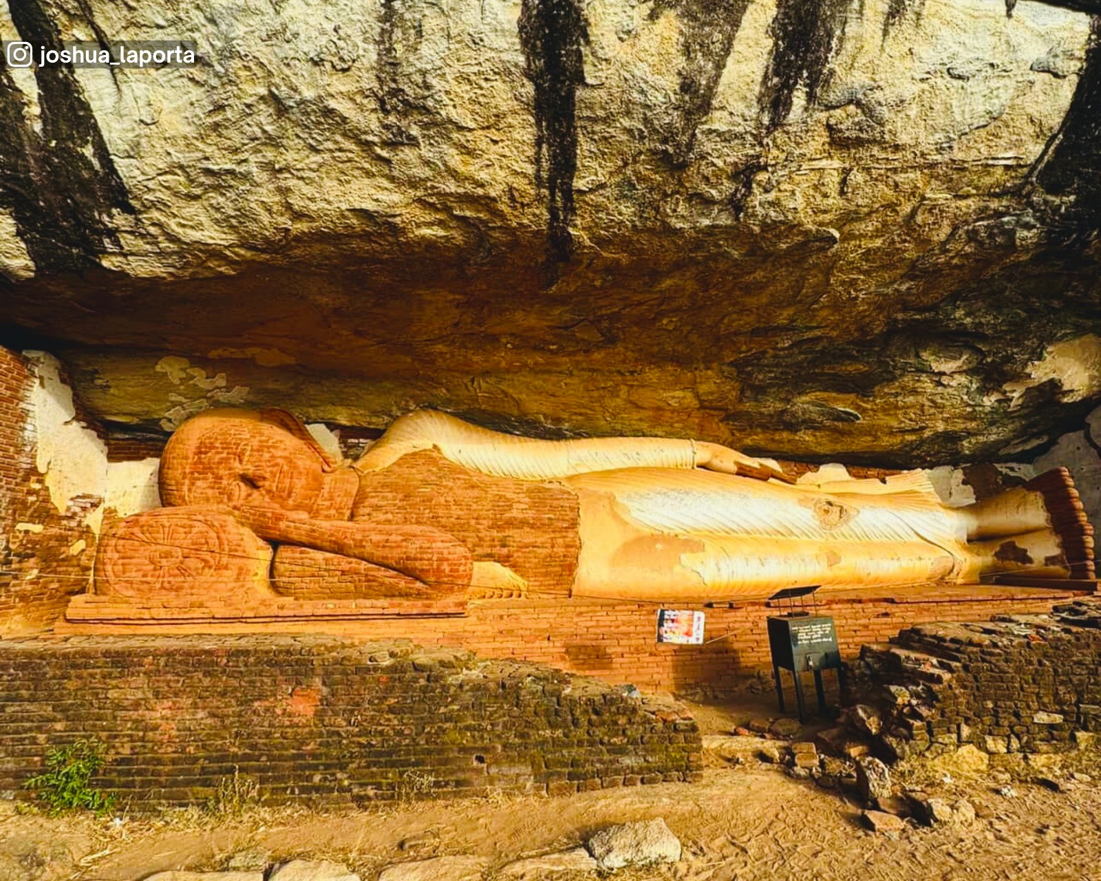 Restored reclining Buddha statue at Pidurangala Rock