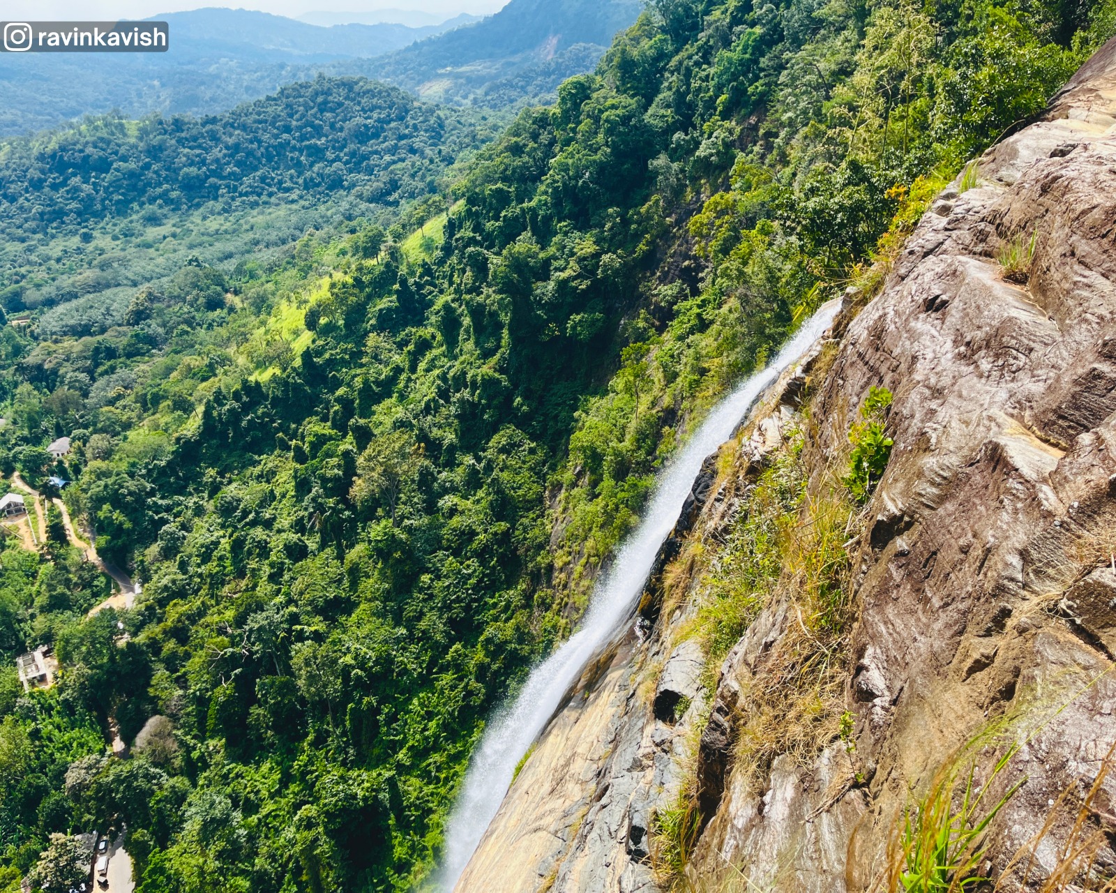 Side view from the summit of the final drop of Diyaluma Waterfall in Ella showcasing Sri Lankas natural beauty and scenic landscapes