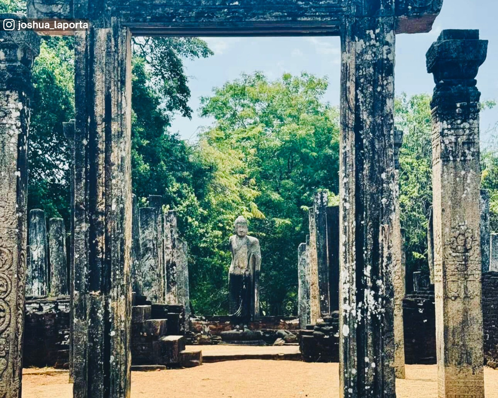 Stone arch with Buddha statue of Atadageya in Polonnaruwa Sacred Quadrangle