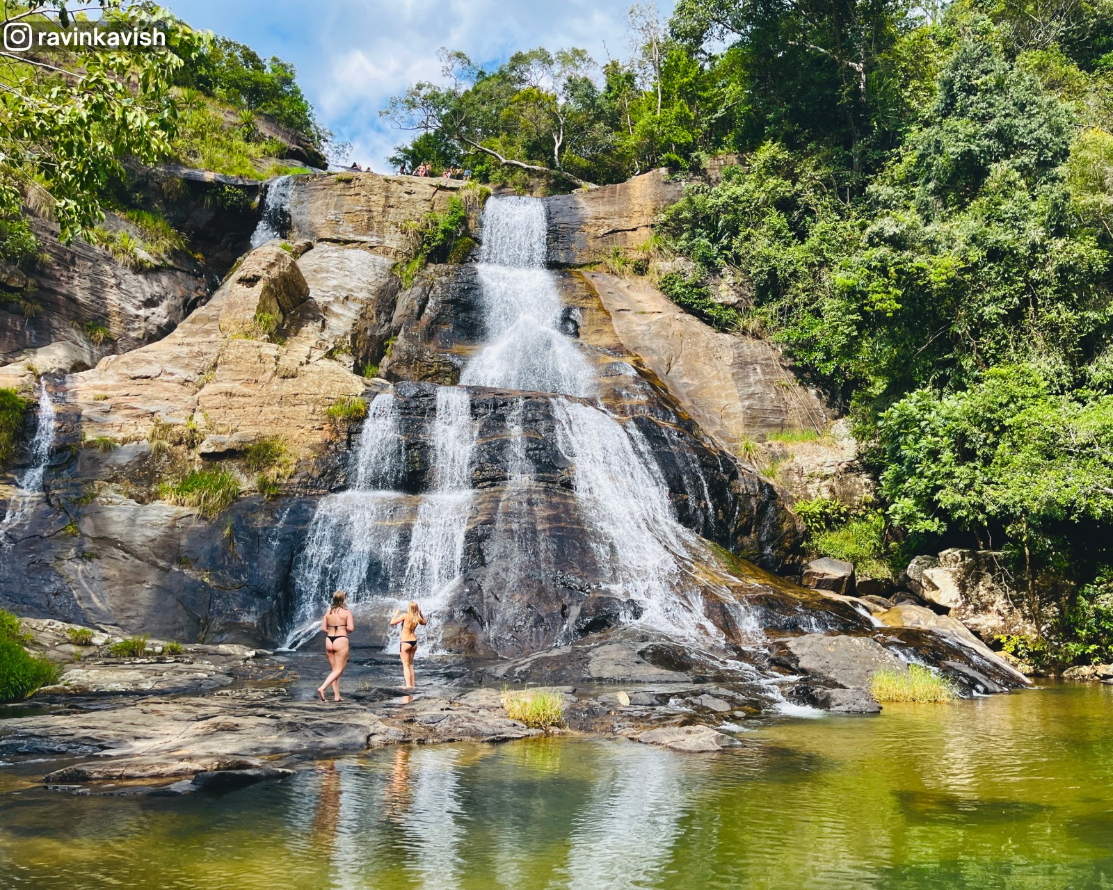 Upper Diyaluma Waterfall in Ella with its basin, rock formations, and surrounding nature showcasing Sri Lankas natural beauty