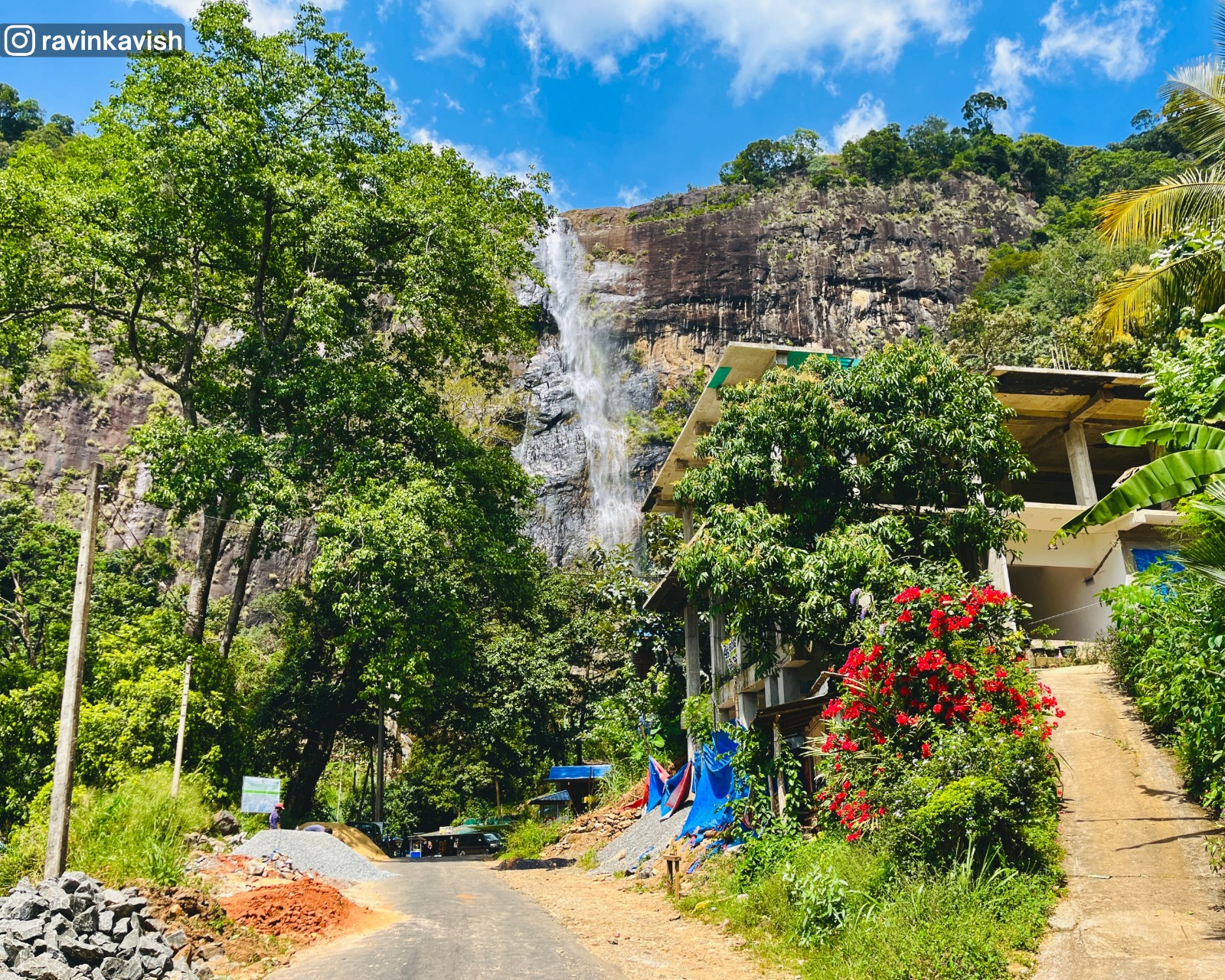 View of Diyaluma’s final waterfall in Ella and the surrounding nature from the street showcasing Sri Lankas scenic landscapes