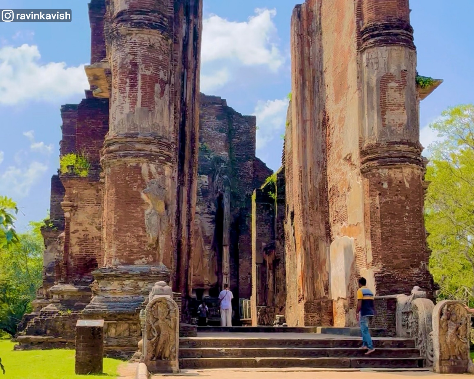 View of Lankathilaka Temple and a prominent standing Buddha statue at Alahana Pirivena, Polonnaruwa