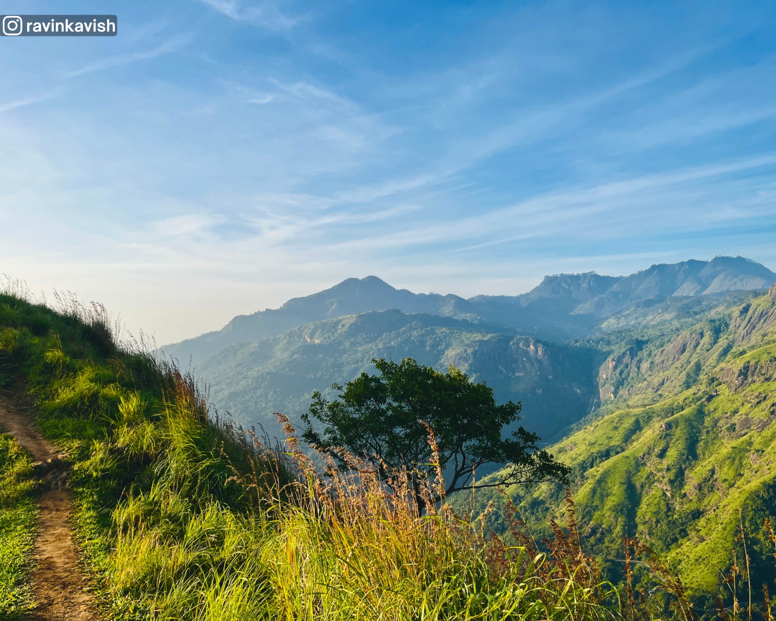 Surroundings from the summit of Little Adams Peak in Ella with distant mountains showcasing Sri Lankas scenic hill country