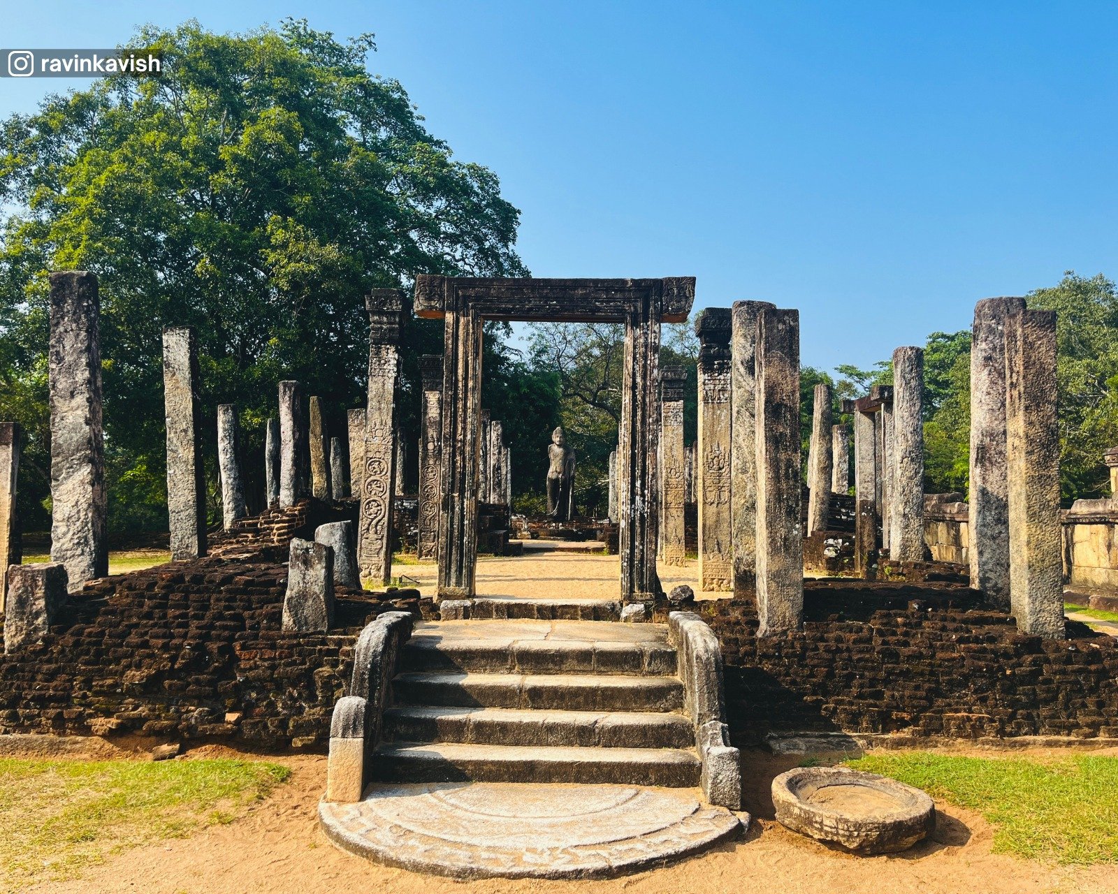 Stone arch with Buddha statue of Atadageya in Polonnaruwa Sacred Quadrangle