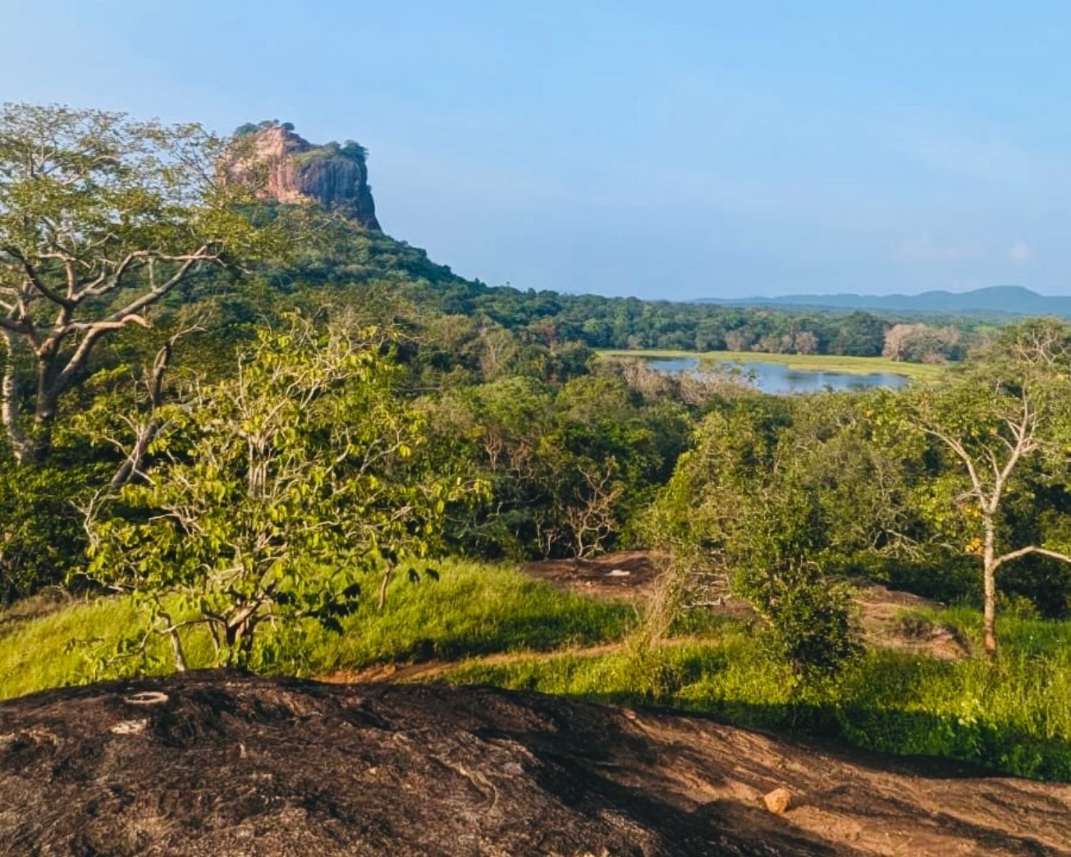 View of Sigiriya Lion Rock and lake from mid-tier plateau at Mapagala Fortress Little Pidurangala Sri Lanka