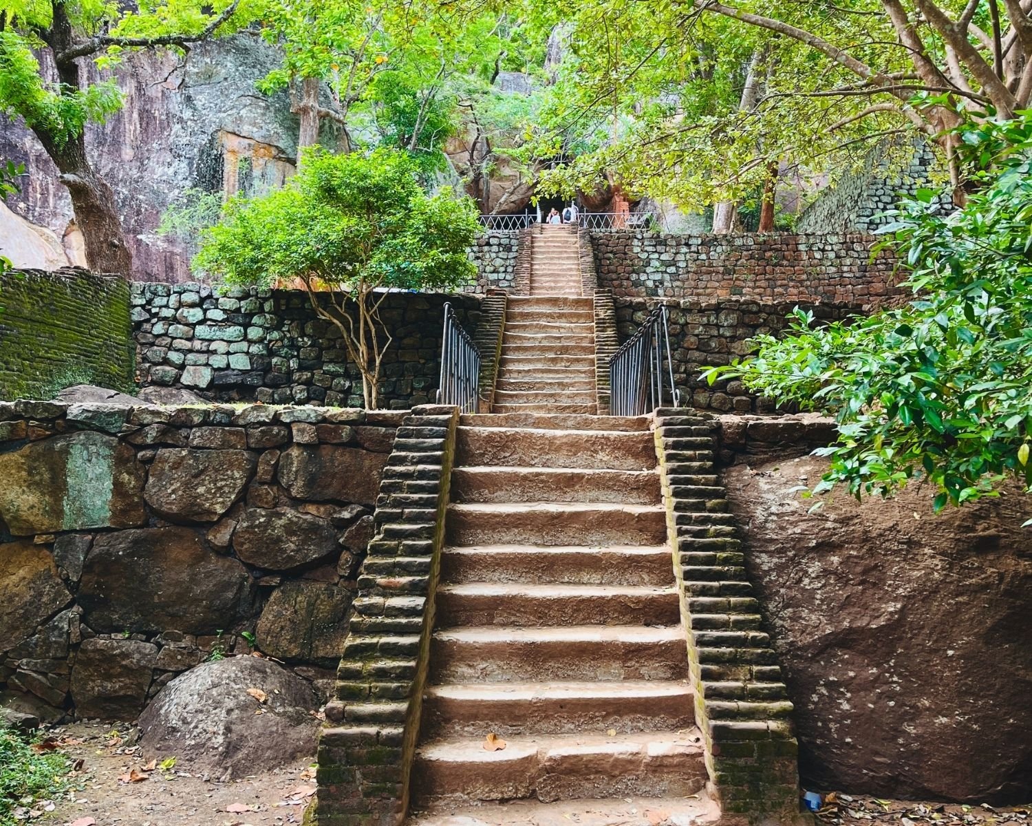 Sigiriya Rock ancient stone staircase in Boulder Gardens Sri Lanka