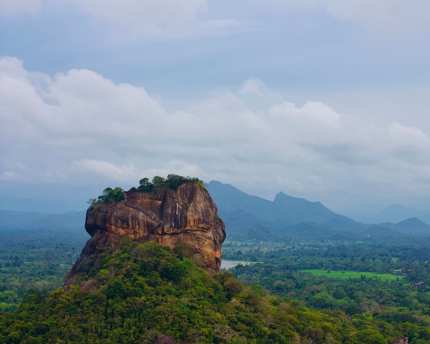 Sigiriya Rock full view from Pidurangala with stairs Sri Lanka