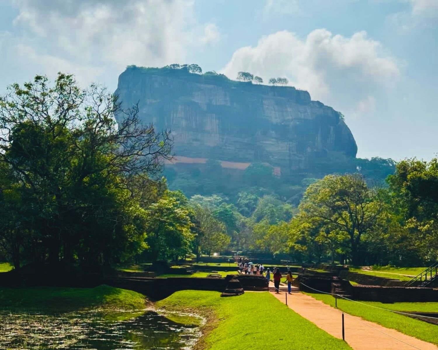 Sigiriya Rock front view from Water Gardens with pond Sri Lanka