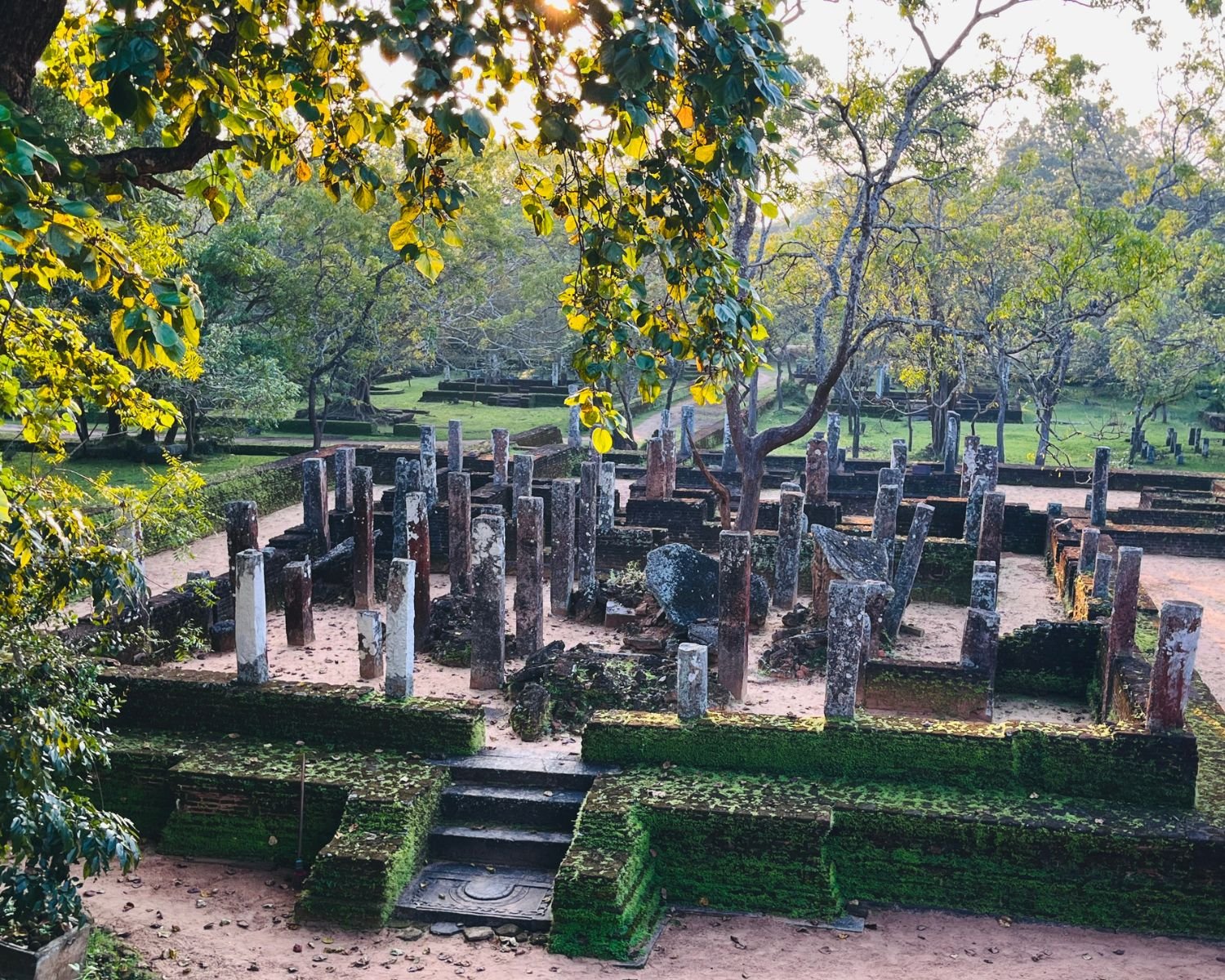 Stone pillars and brick foundations of the Chapter House at Alahana Pirivena