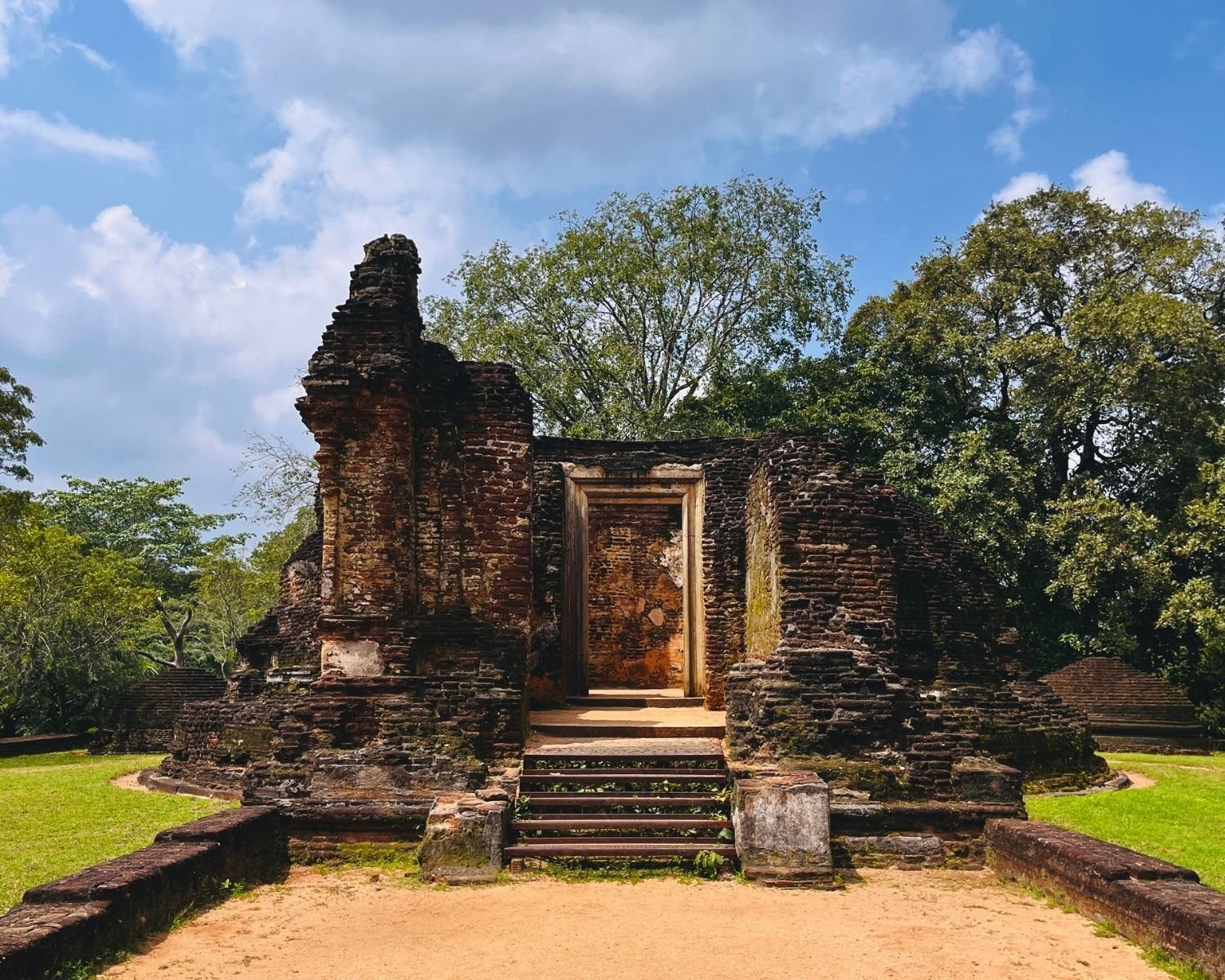 Front view of central circular shrine at Potgul Vihara showing ancient brick entrance and doorway