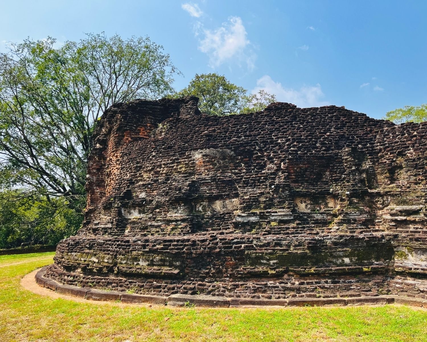 Outer curved wall of central circular shrine at Potgul Vihara