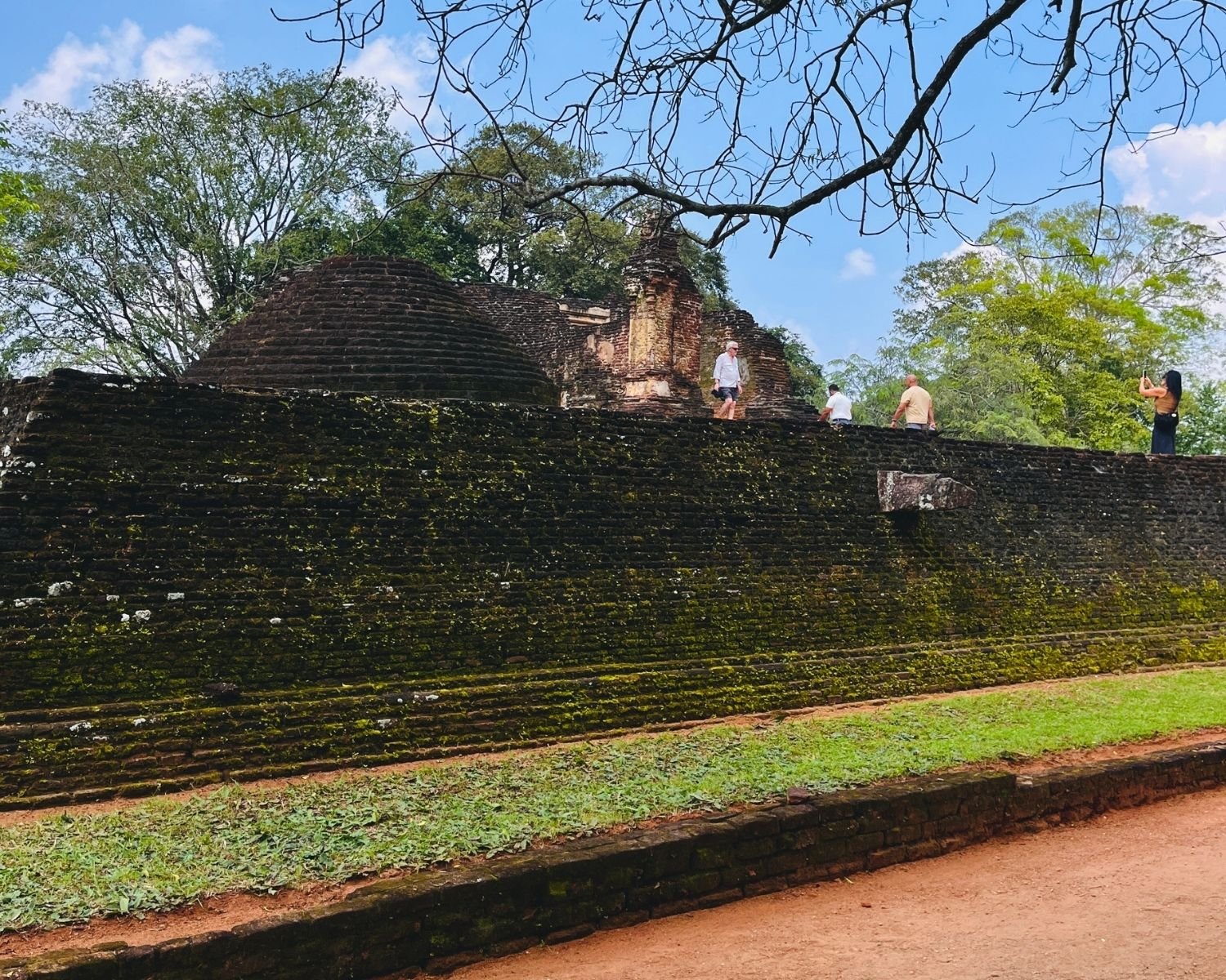 Lower terrace pathway at Potgul Vihara beside residential cell remains and central terrace wall