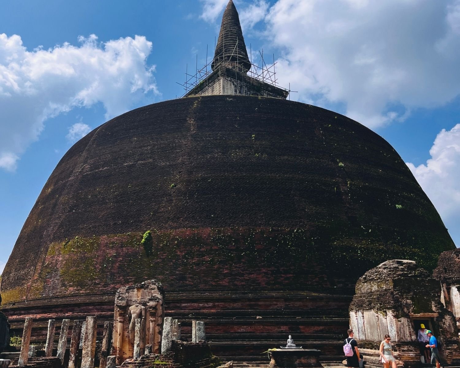 Rankoth Vehera dome with surviving standing Buddha image house, vahalkada, and spire scaffolding