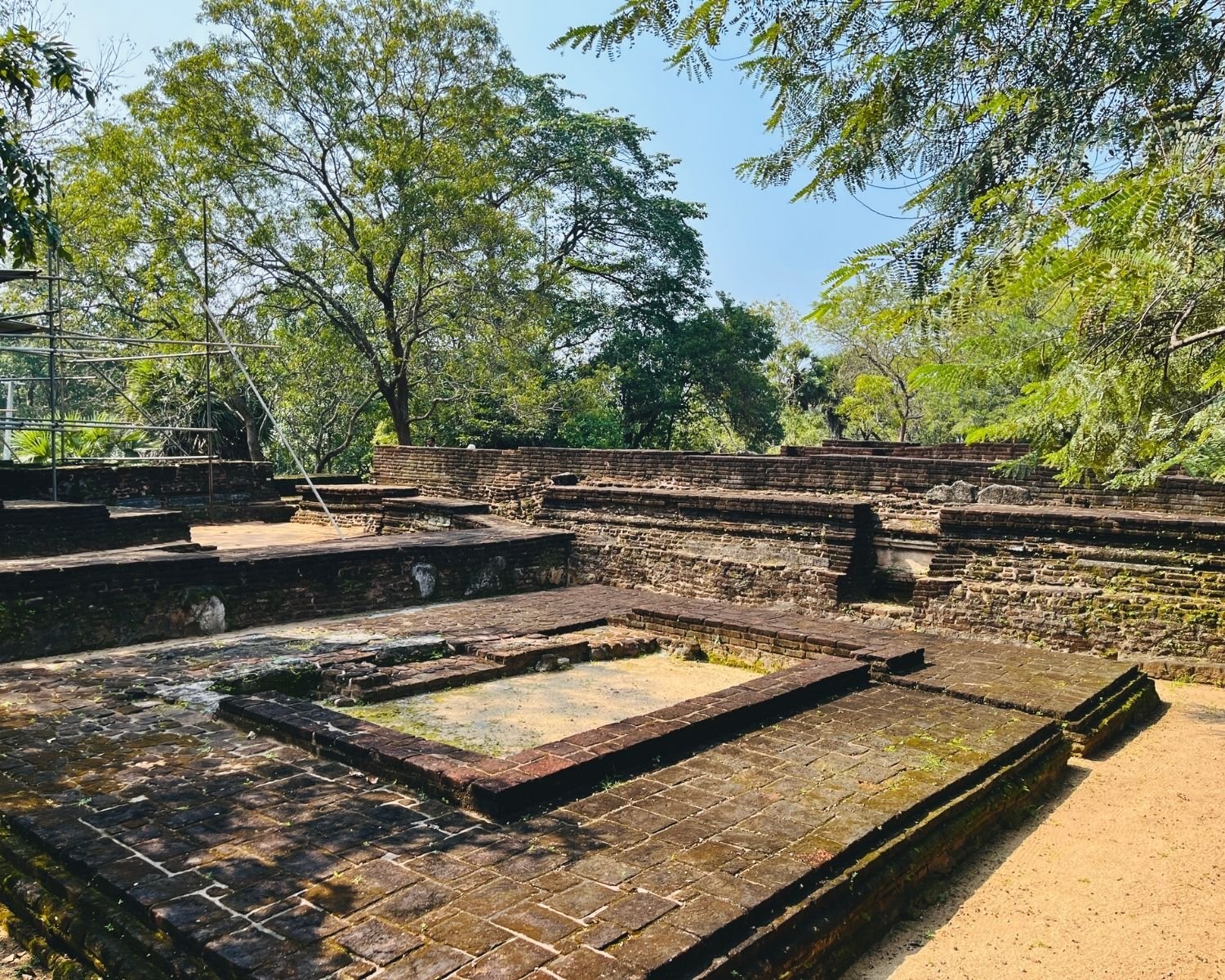 Brick foundation remains in Royal Palace Complex showing thick walls, raised platforms, and stone paving