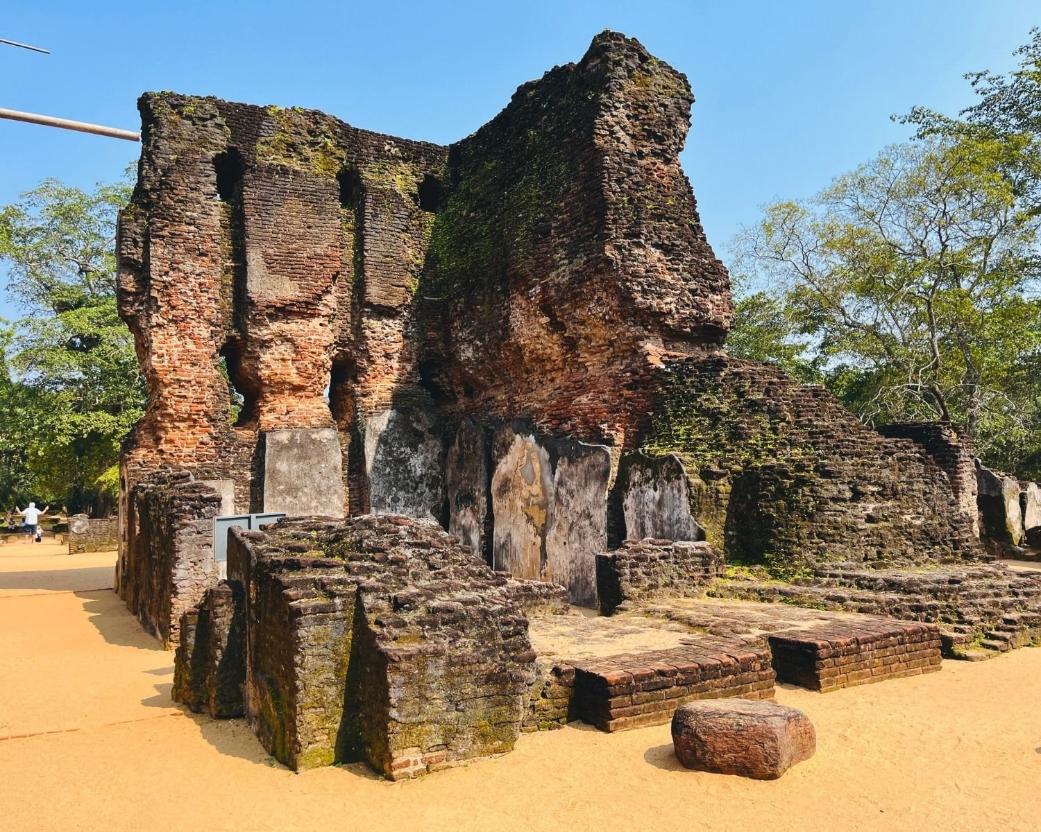 Corner view of surviving brick wall of Royal Palace with adjoining ruined rooms