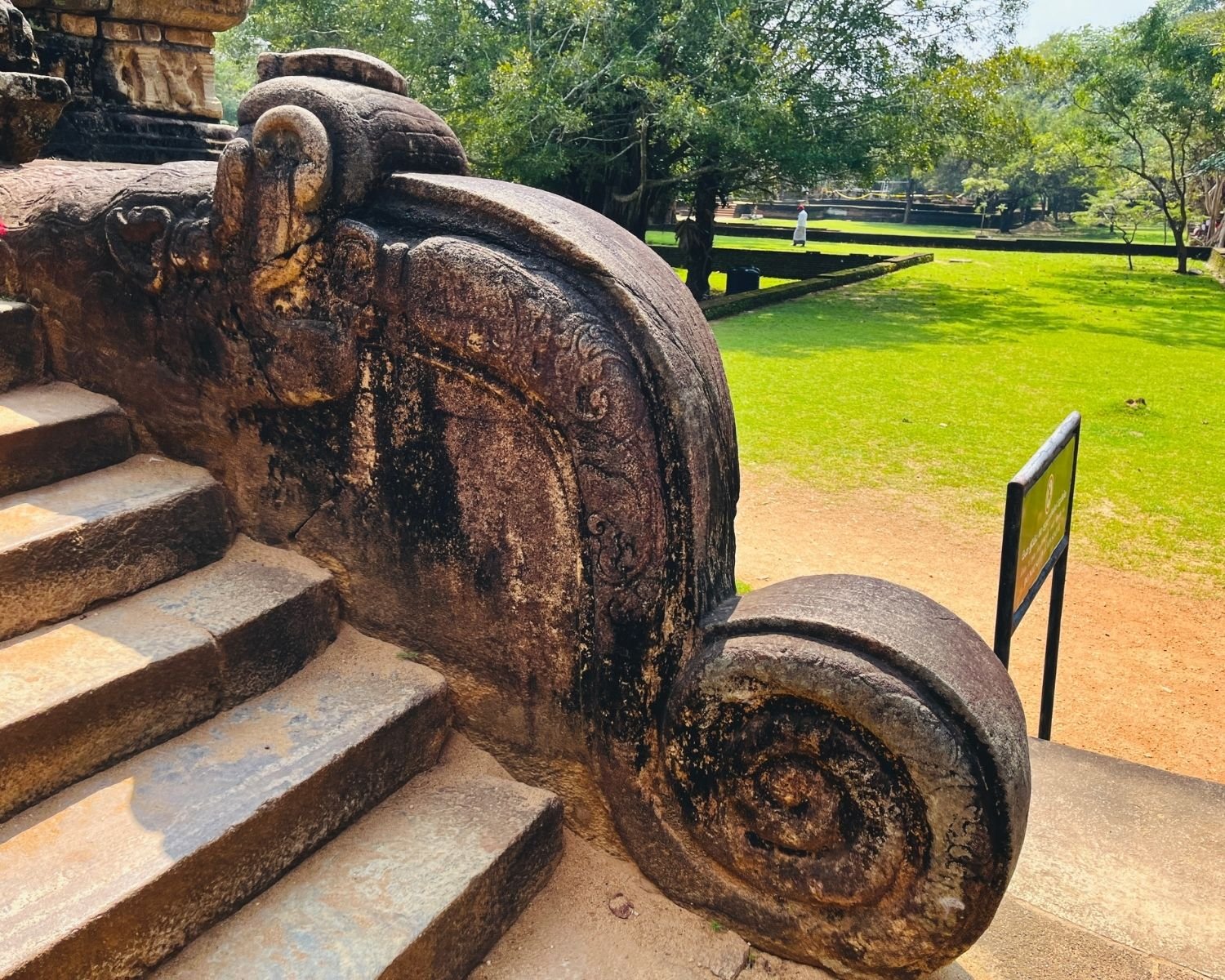 Stone balustrade and stair detail at Council Chamber showing scroll carving and side steps