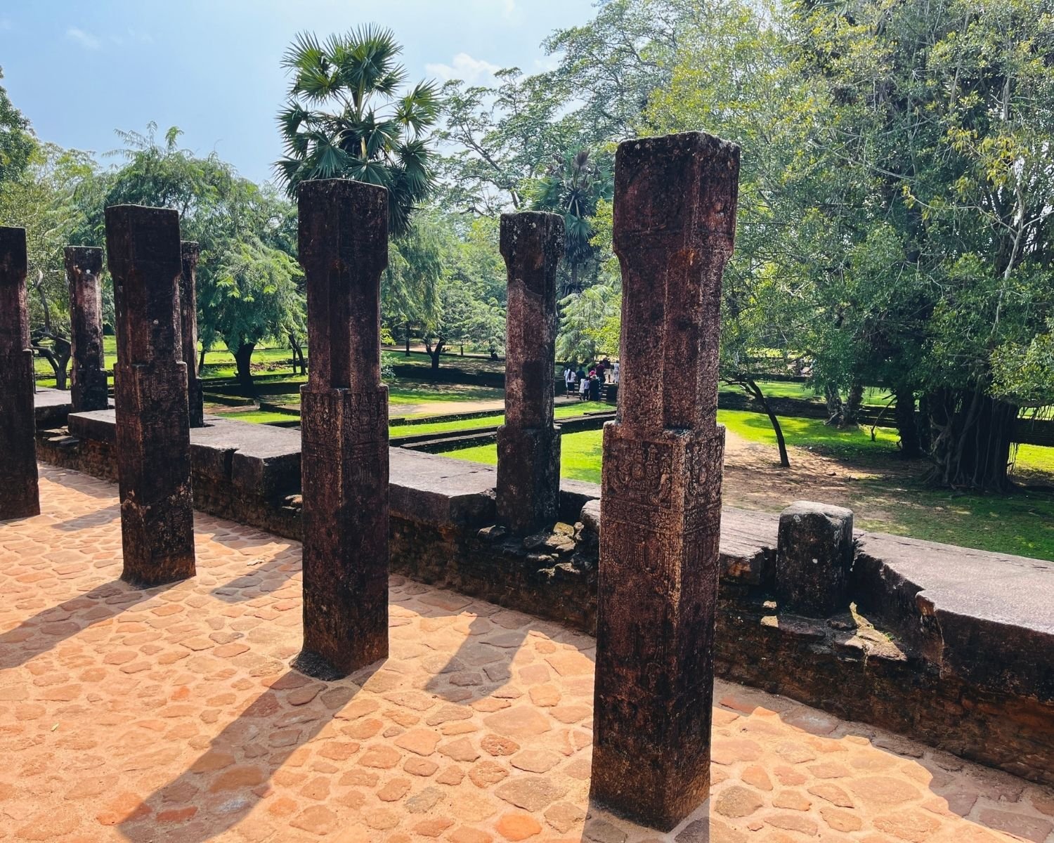 Carved stone pillars on upper platform of Council Chamber overlooking palace grounds