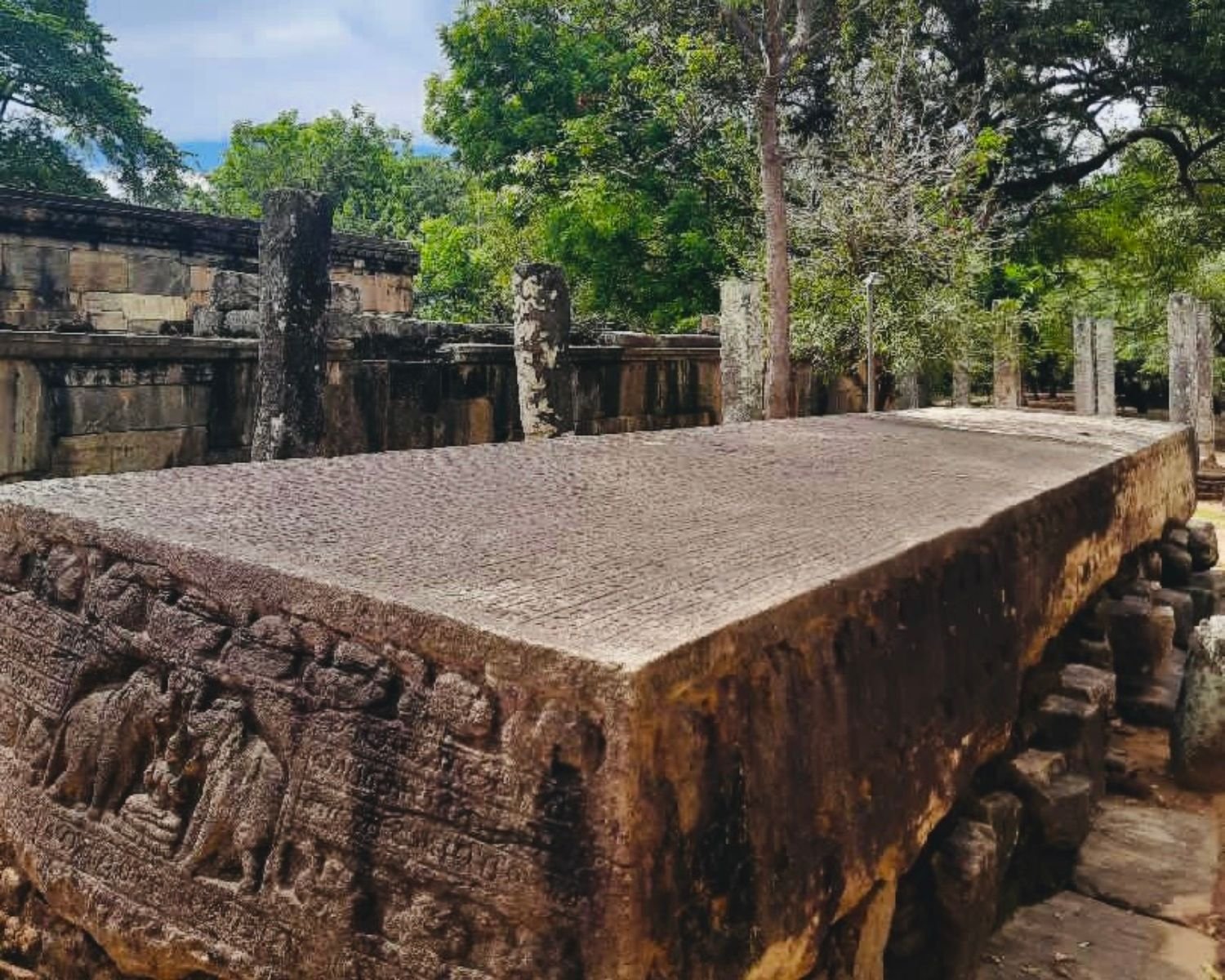 Top surface view of Gal Potha Stone Book showing long inscription slab and carved elephant panel