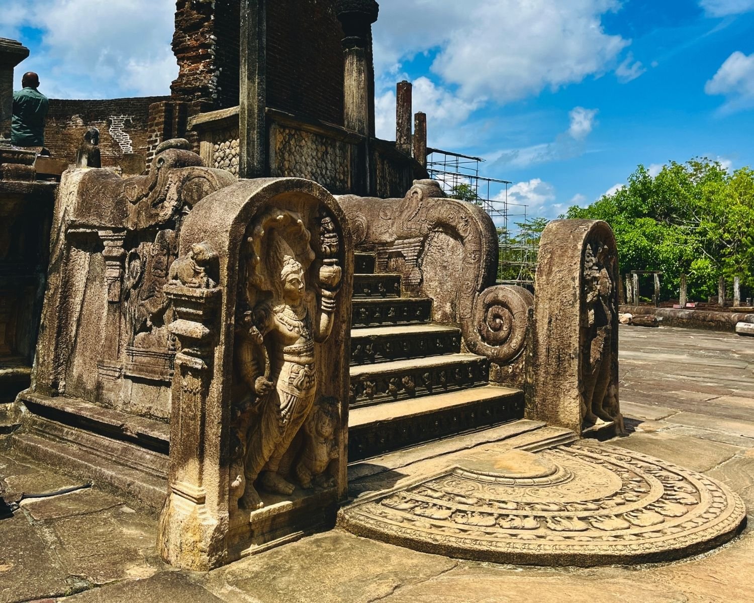 Entrance to Vatadage with carved moonstone, makara balustrades, guard stones, and ornate steps