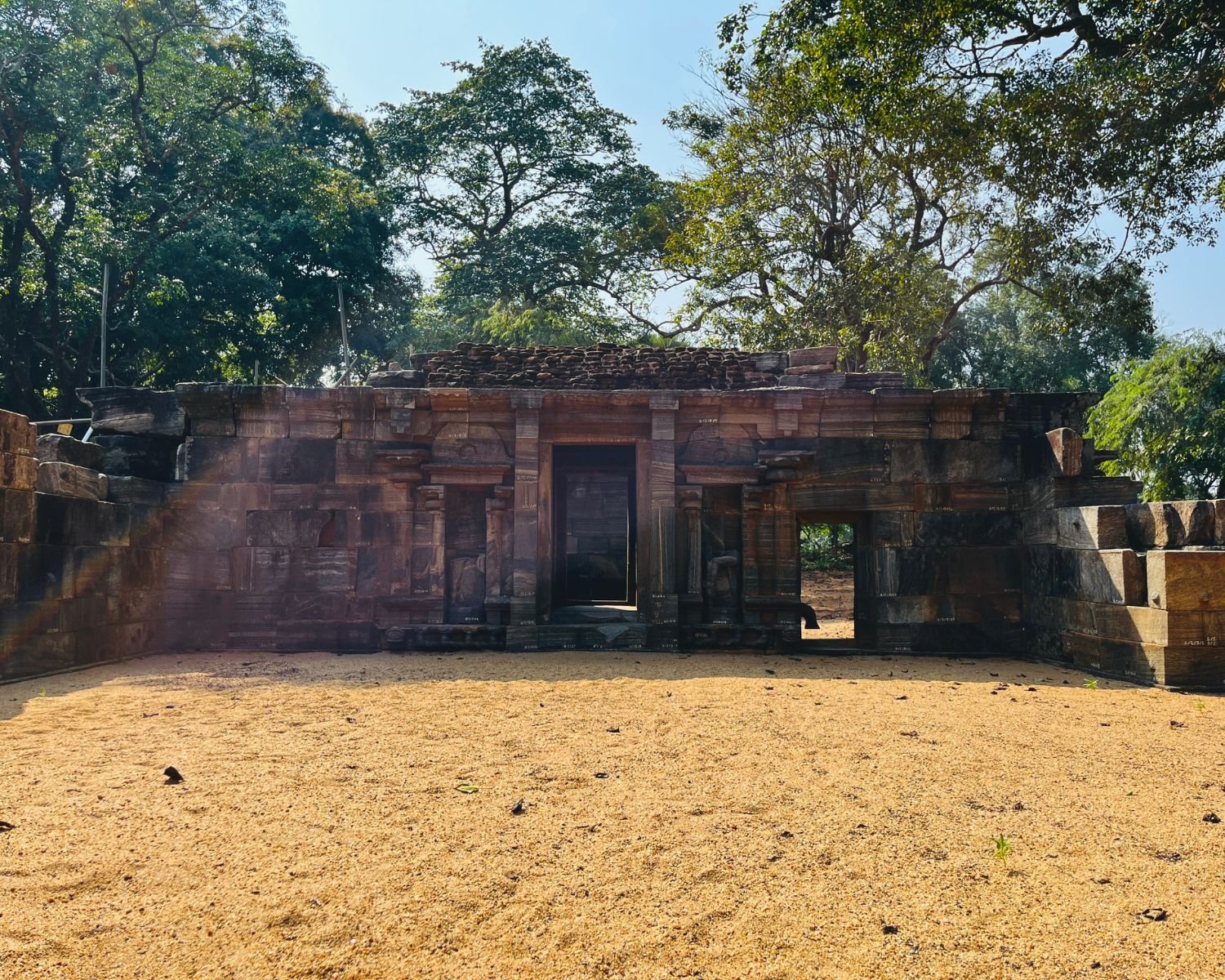 Front view of inner shrine at Shiva Devalaya No.1 showing stone doorway and carved pilasters