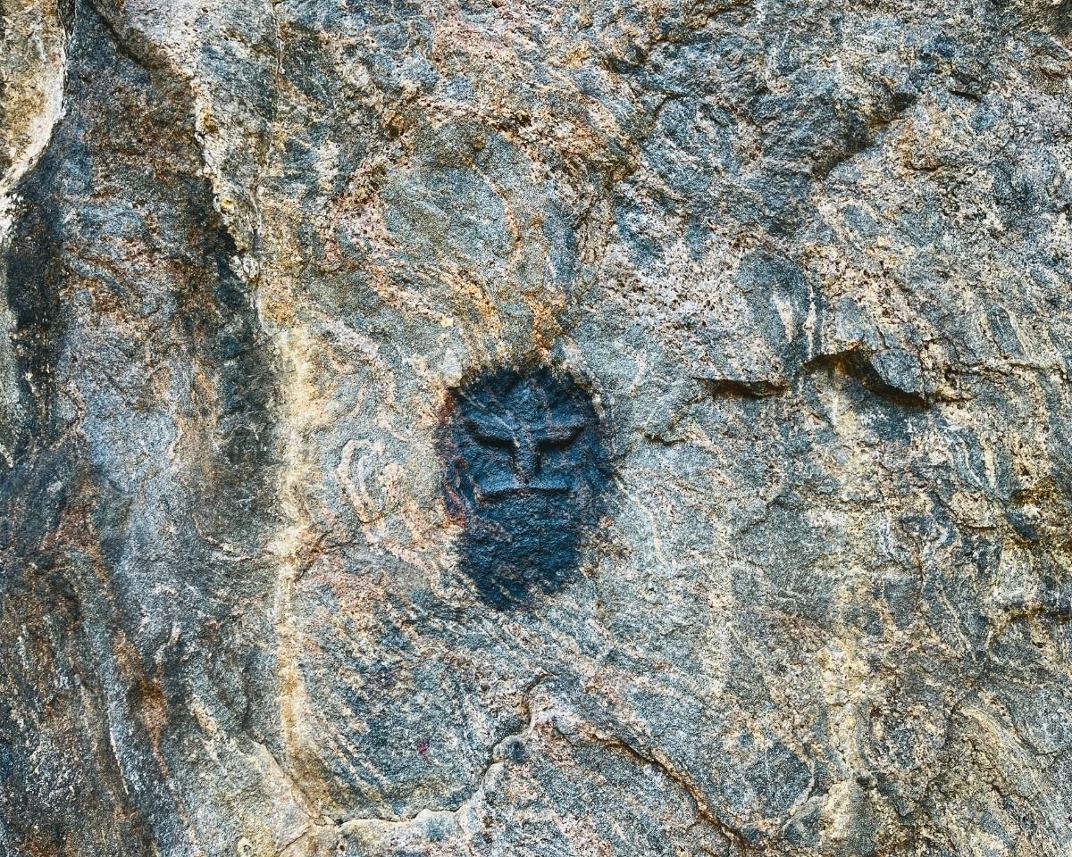 Flame-shaped cavity carved into the Buduruwagala rock face