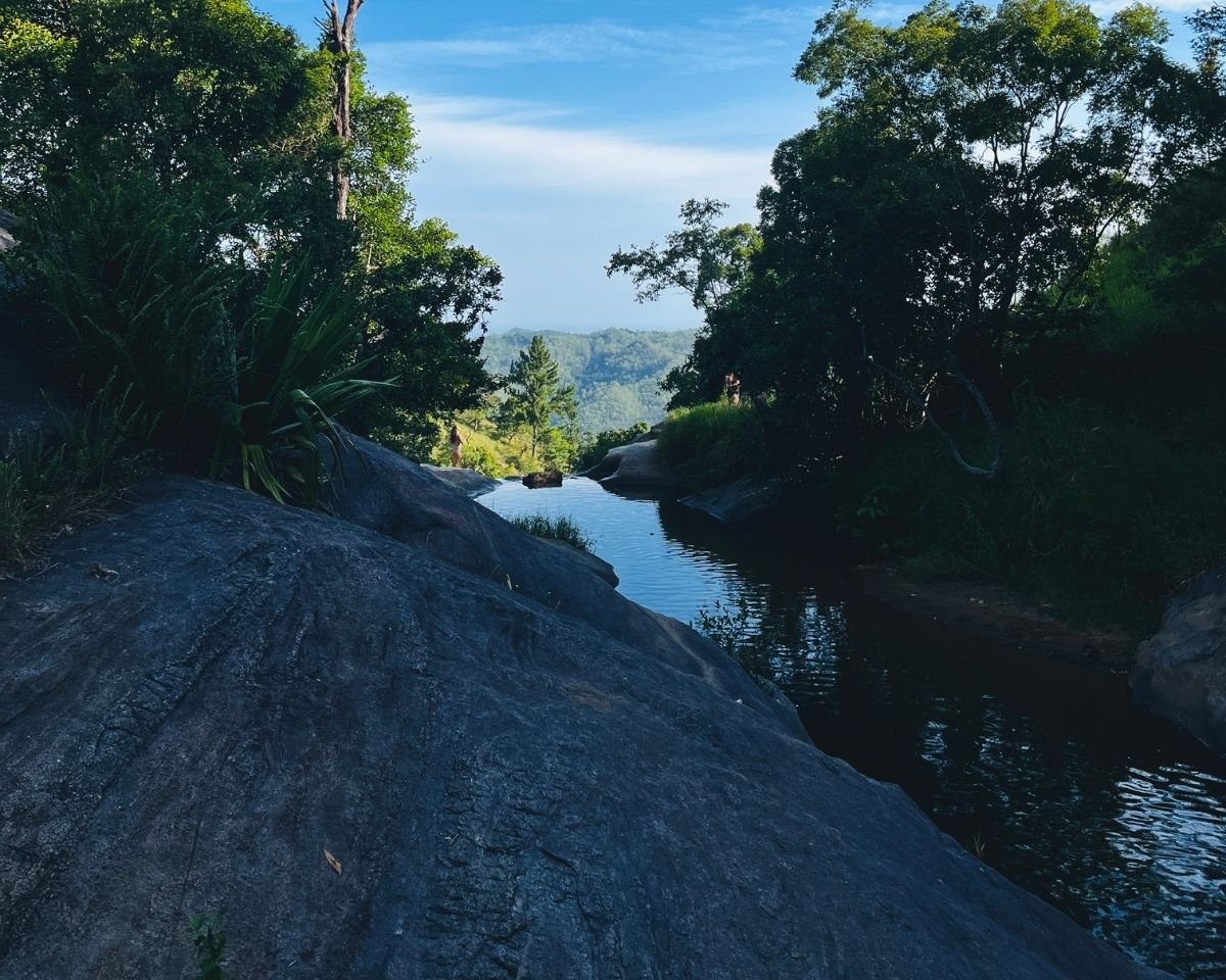 River channel flowing across smooth bedrock