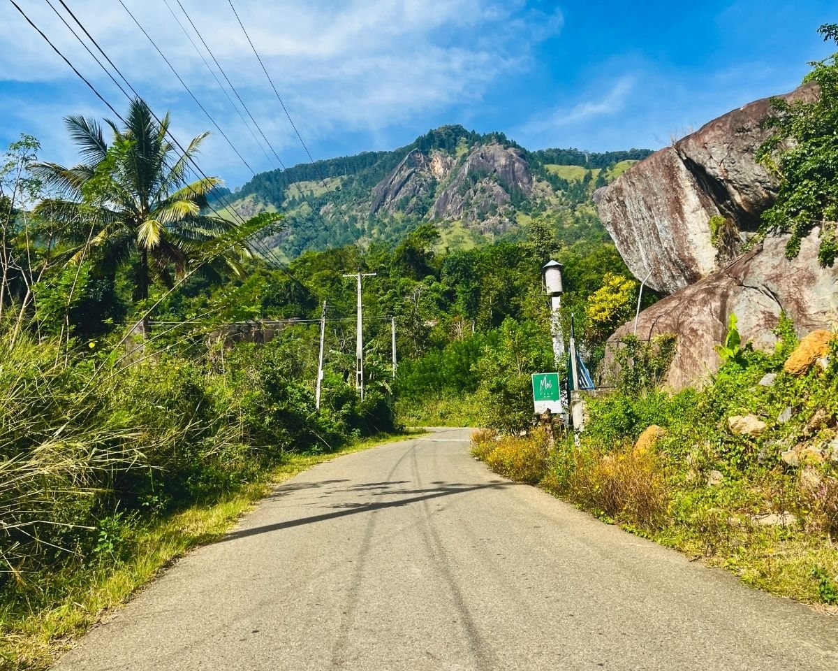 Rocky cliff face and forested slopes at Kurullangala