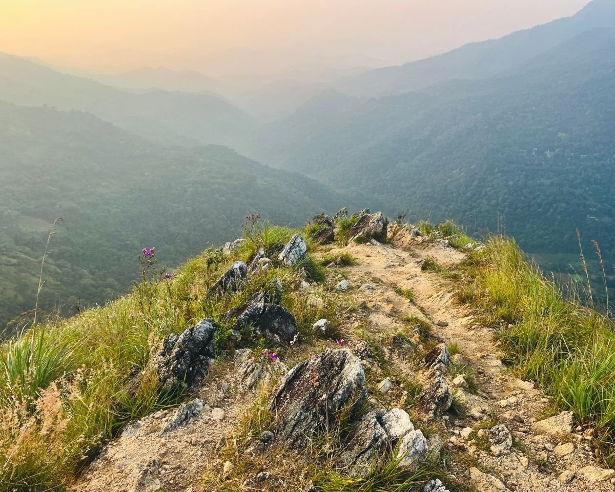 Rocky path climbing toward the end of the ridgeline