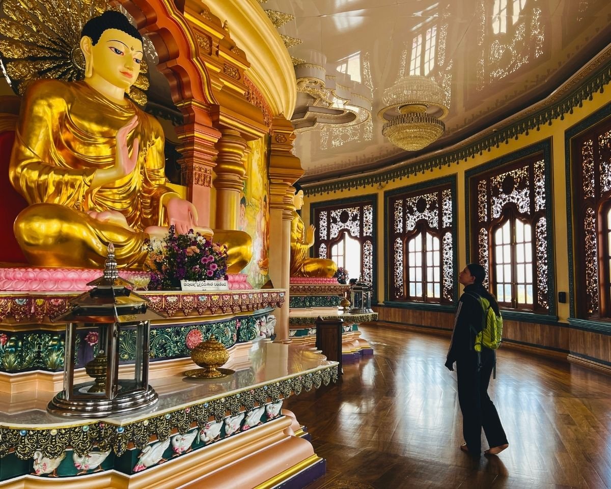 Golden Buddha statue inside the Sri Satbudu Maha Seya