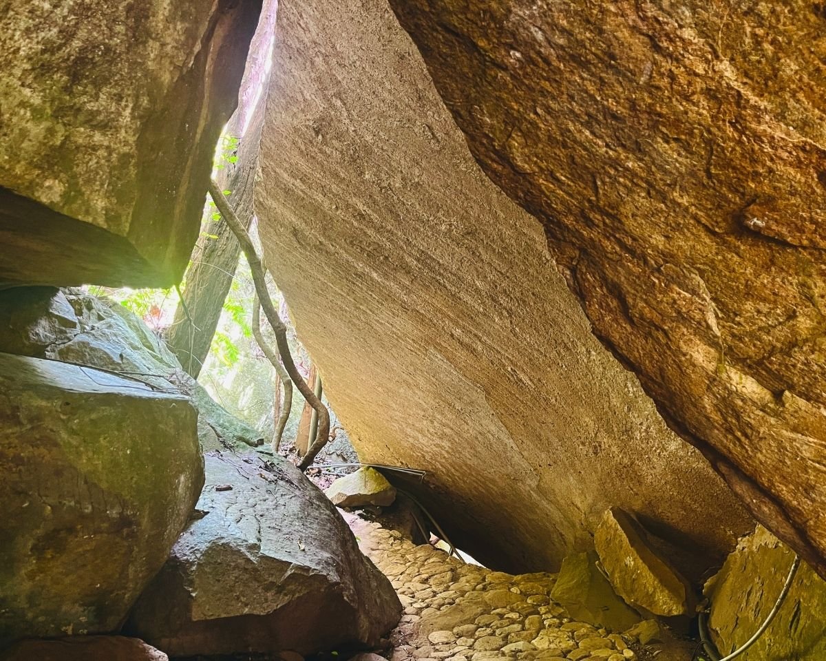 Stone pathway passing between giant boulders