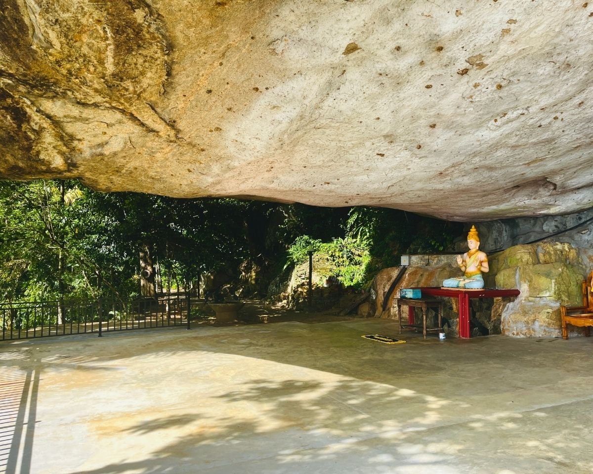 Open-sided rock shelter used as part of the monastery