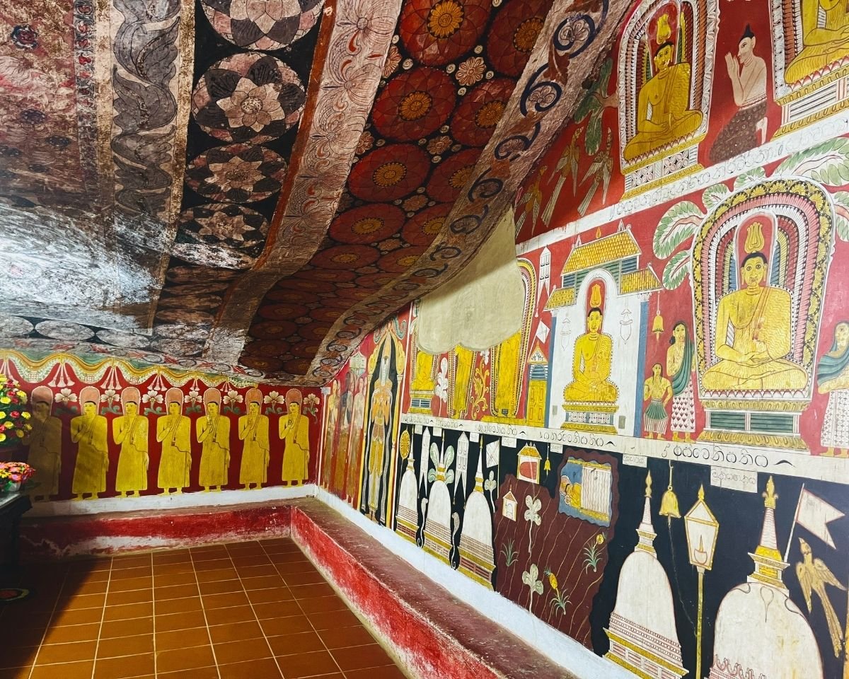 Rows of Buddha paintings covering the shrine walls
