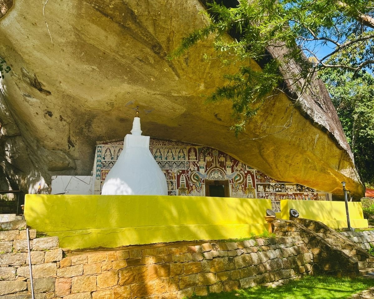 Cave temple and stupa beneath a natural rock shelter