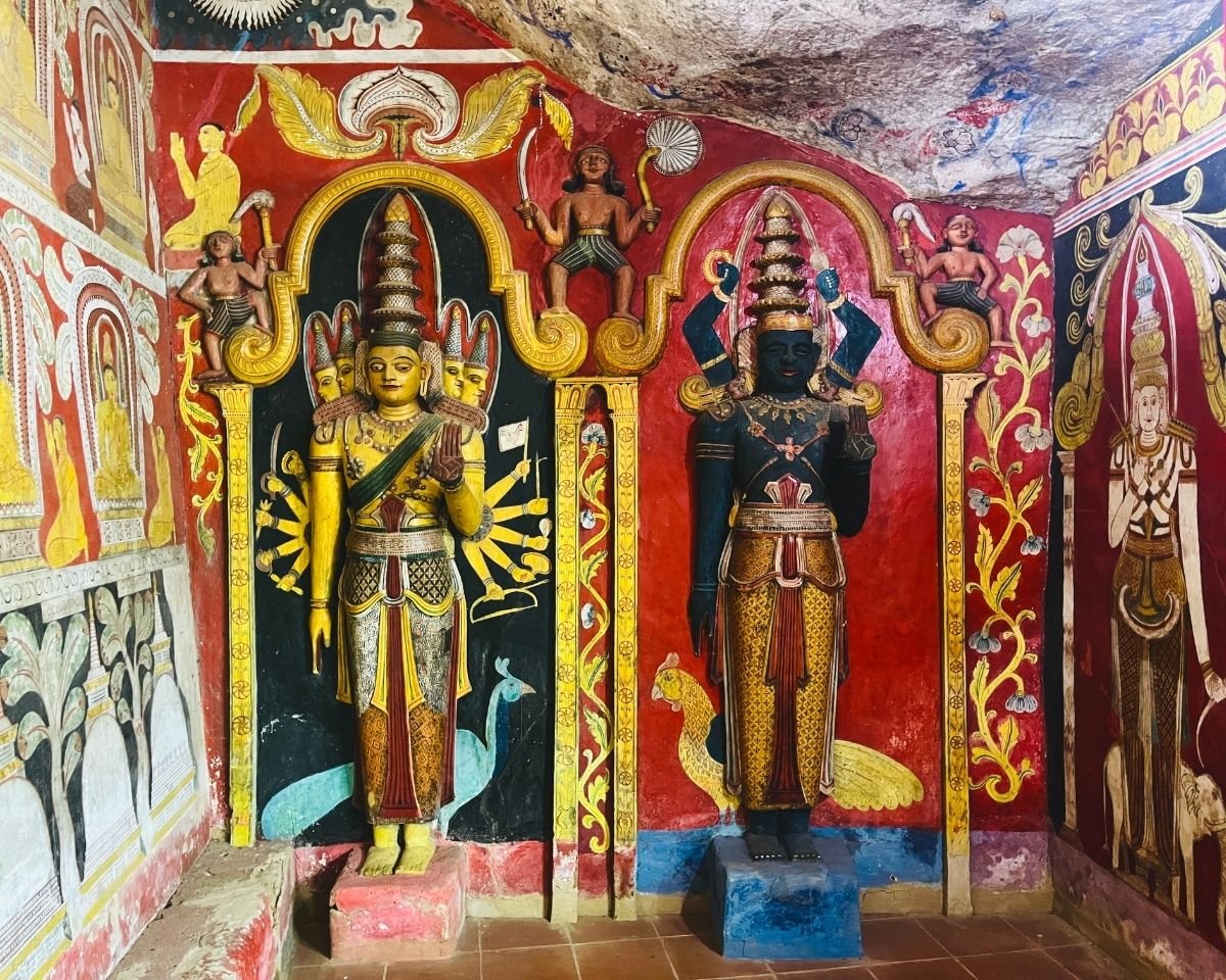 Murugan and Vishnu statues inside the shrine