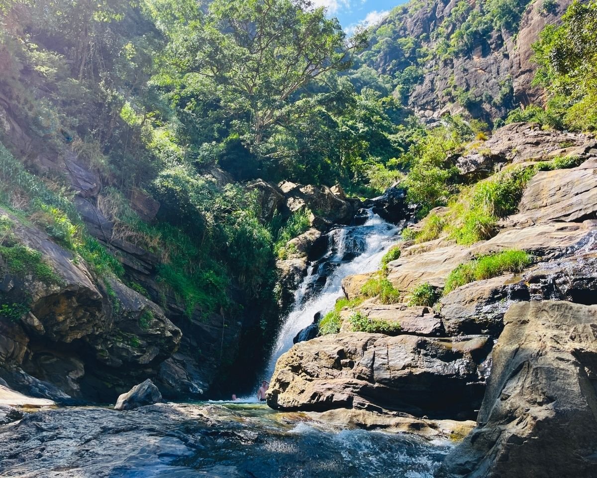 Main cascade of Ravana Falls flowing into a natural pool