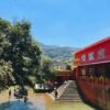 Seetha Amman Kovil - Bathing Ghat at Seetha Eliya in Nuwara Eliya Stone steps and red temple building at the bathing ghat on Seetha Eliya stream beside Seetha Amman Kovil Hindu temple, Nuwara Eliya, Sri Lanka